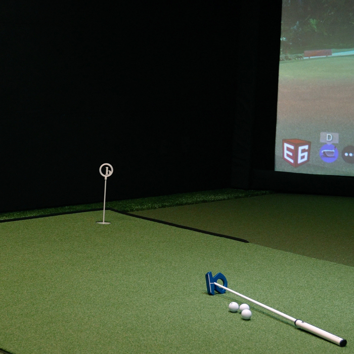 Birdieball putting mat in a golf simulator