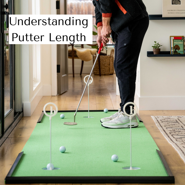 Man is getting ready to putt on his at-home putting mat