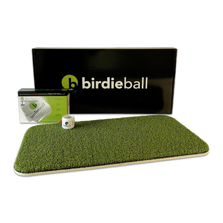 The BirdieBall Turf Set features a rectangular artificial turf mat and a dozen limited flight practice golf balls—ideal for creating your own backyard driving range—all shown against a clean, white backdrop.