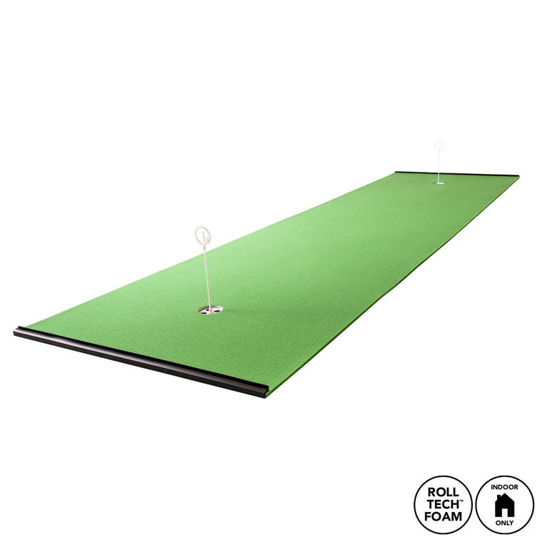 The BirdieBall 4' x 10' Standard Putting Mat is a long indoor RollTech™ putting green with two golf holes, flags, and a foam base. "Roll Tech Foam" and "Indoor Only" icons appear in the bottom right corner.