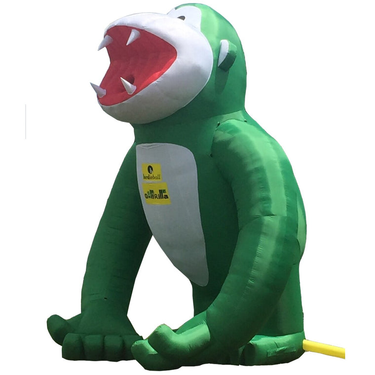 The BirdieBall Golfrilla | Giant Inflatable Golf Target stands out with its large green design, open red mouth, white teeth, and yellow promo sign—ideal as a giant golf inflatable for events or promotions.